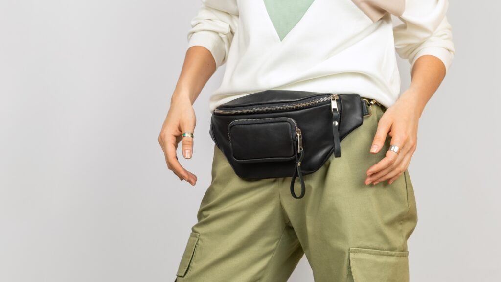 Black Genuine Leather Belt Bag on a Woman