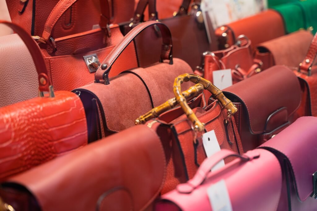 Colorful handbags on display in a boutique shop