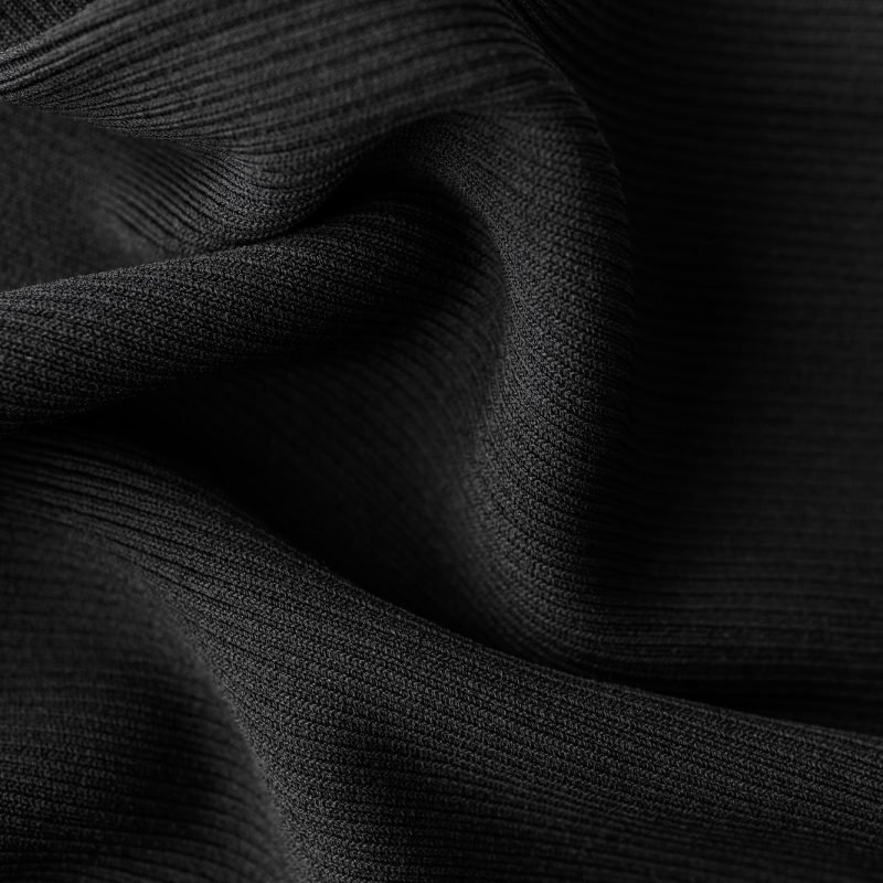 Close-up macro texture of textile material or fabric for abstract blank background or wallpaper.